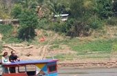 Traditional Long Boat on the Mekong River