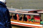 Traditional Mekong long boat for trip on the River